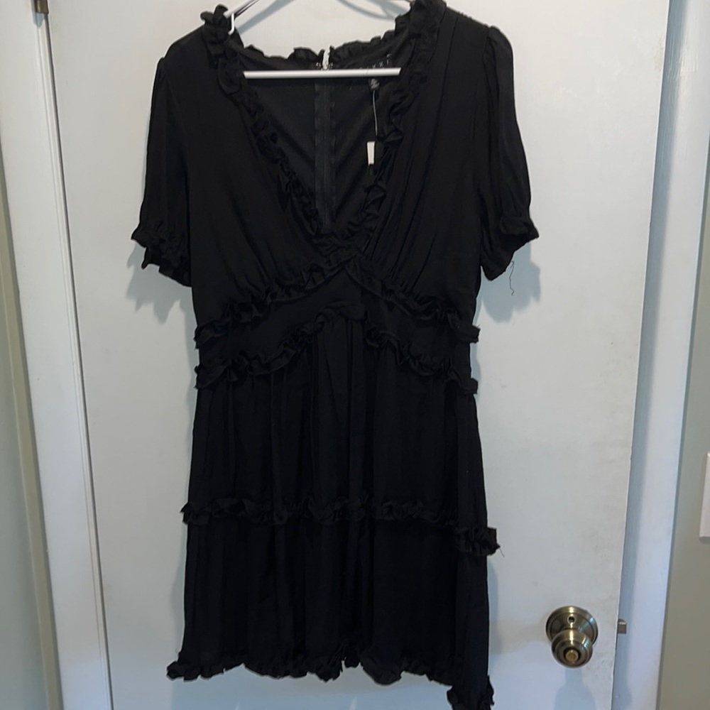 Francesca’s Black ruffle mini dress